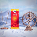 The image shows a box of Shiva Dhoop Agarbatti incense with a depiction of the Hindu god Shiva in a dynamic dance pose against a snowy mountain background. Incense sticks are also visible in the foreground.