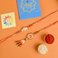 Designer Couple Rakhi Set for Bhaiya and Bhabhi | India’s Largest Brass Idols Brand - www.satvikstore.in