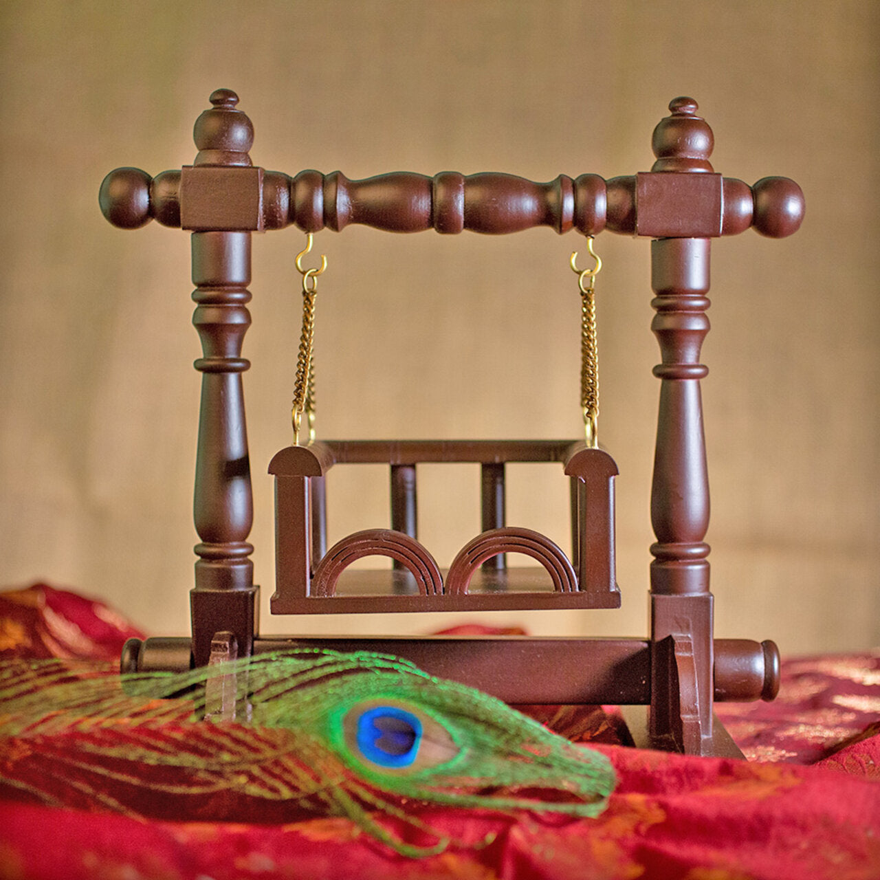 Handcrafted wooden jhula swing for the home altar